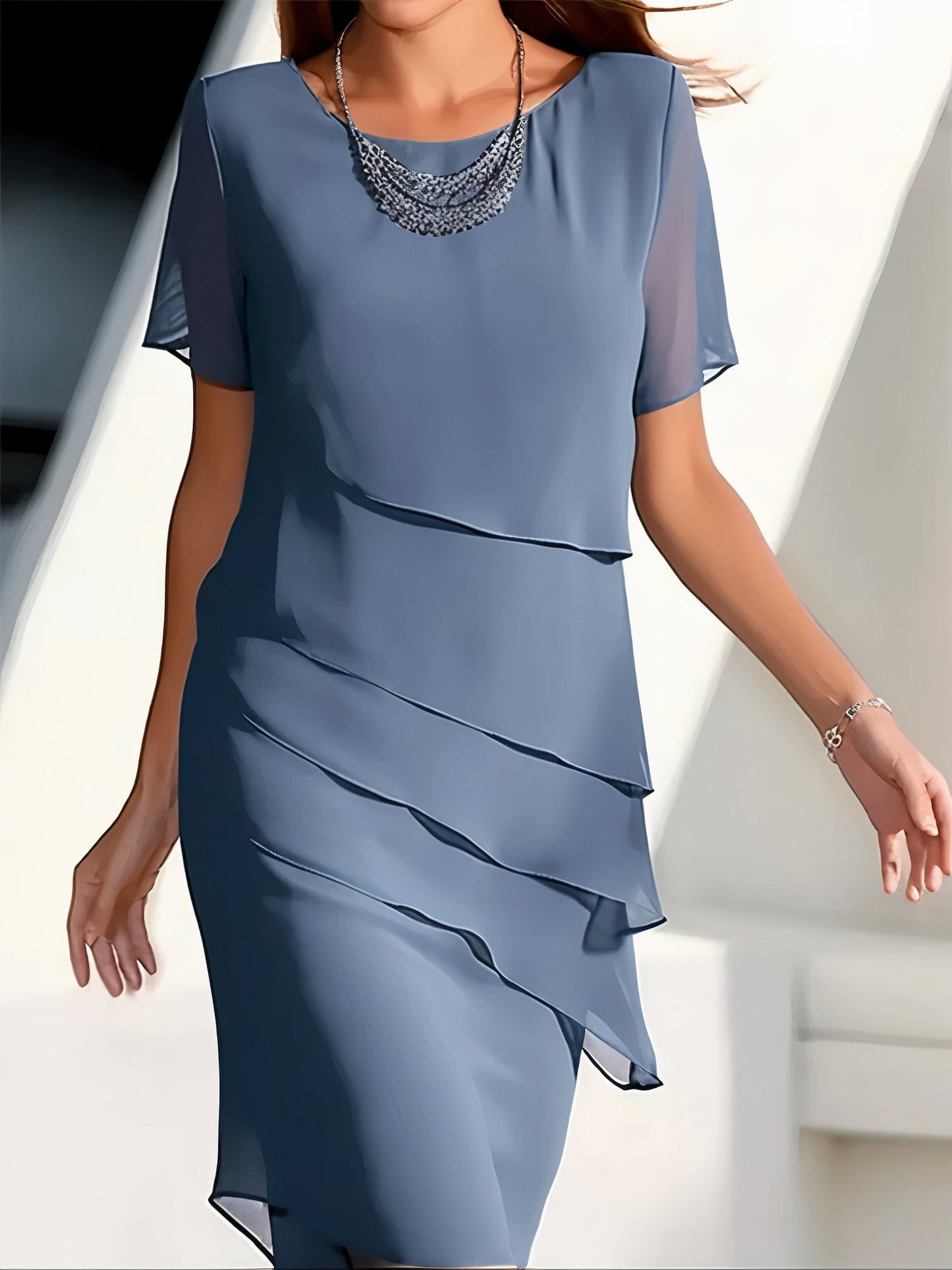 Plissetted dress in silk chiffon