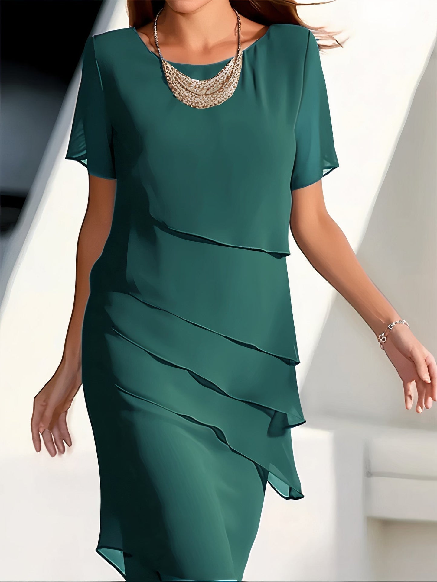 Plissetted dress in silk chiffon