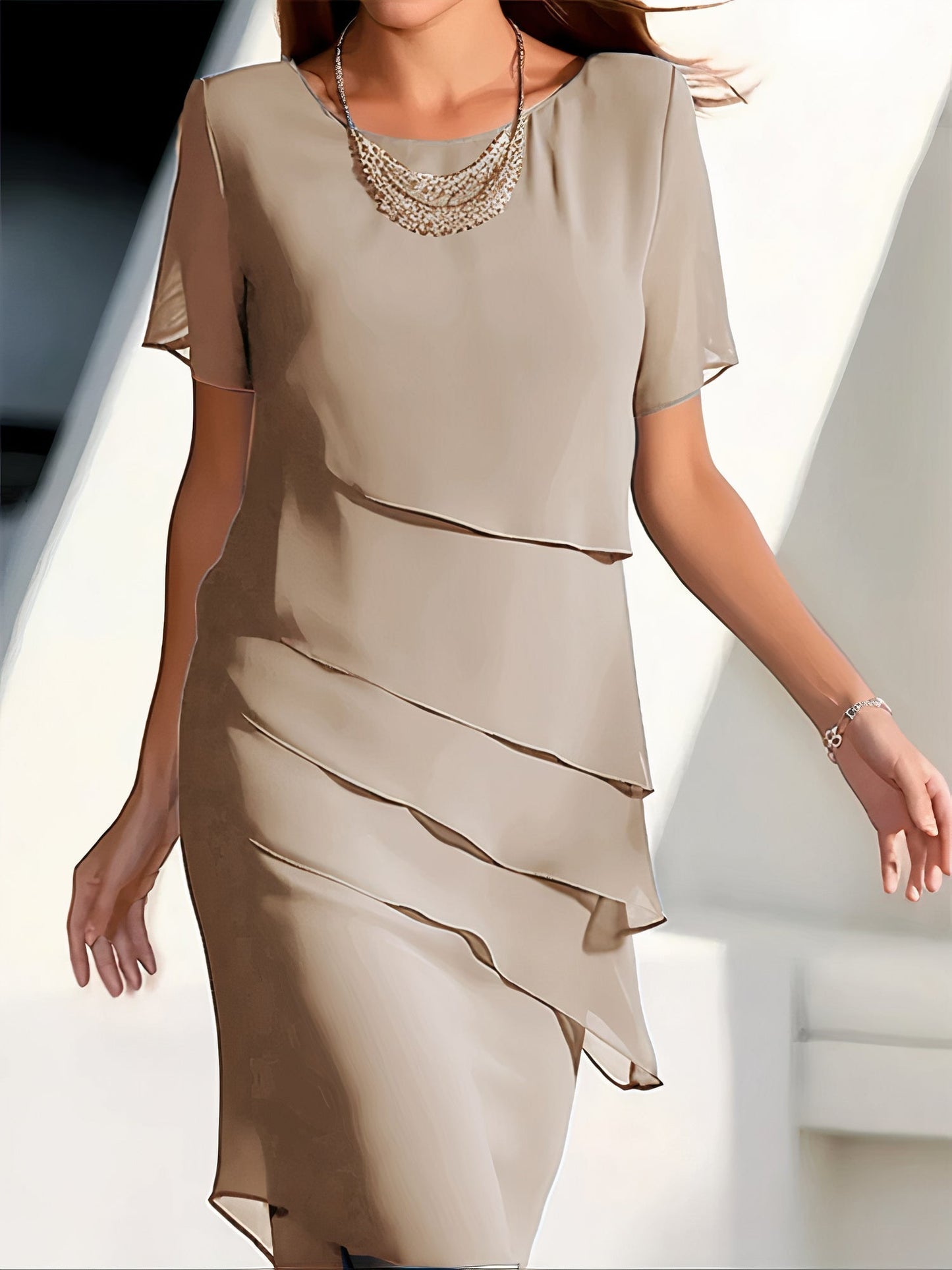 Plissetted dress in silk chiffon