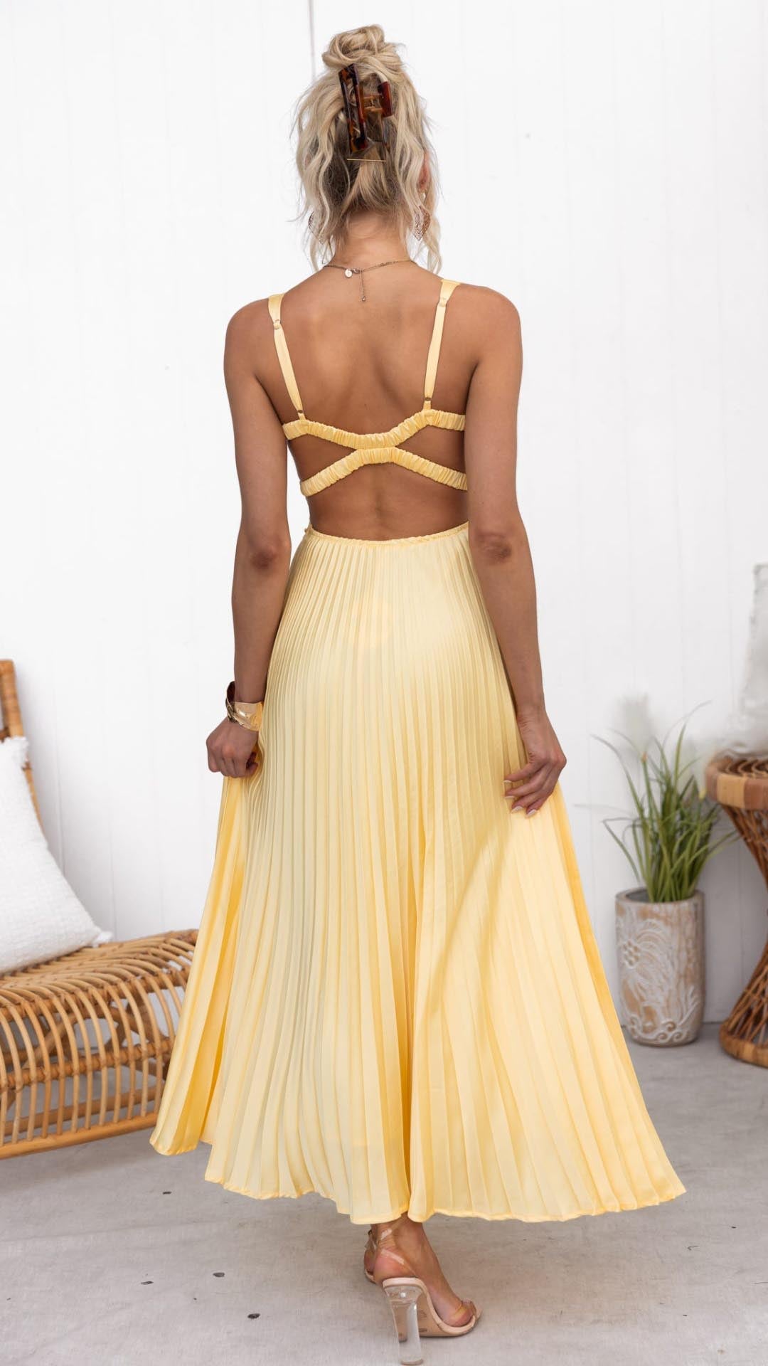 Eline | Elegant long dress with V neckline and pleated skirt